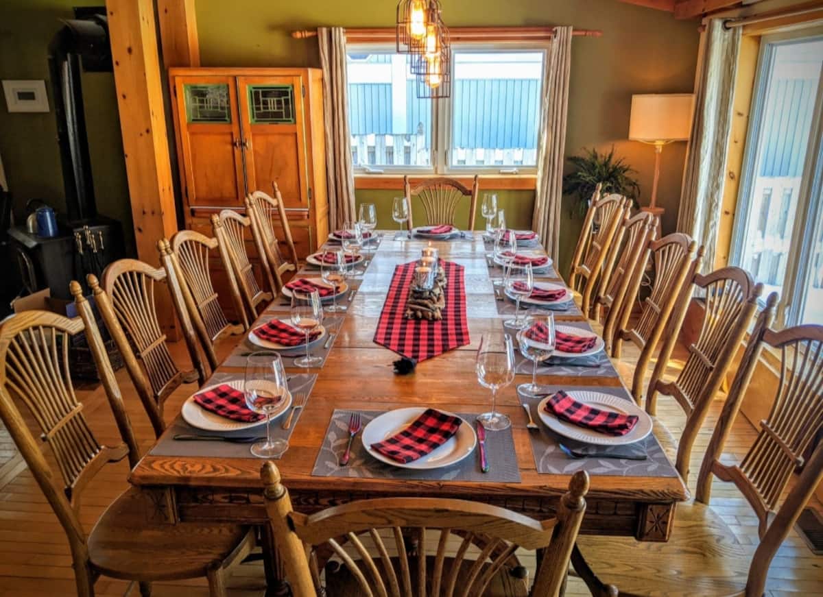 Formal dining room with 10-person table at The Muskoka River Chalet